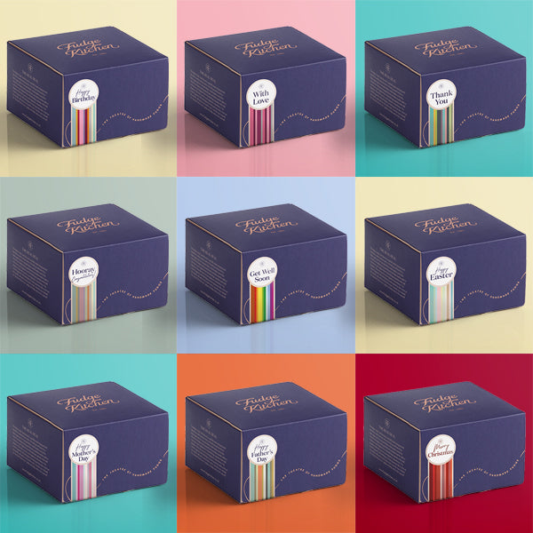 Nine blue boxes with 'Fudge Kitchen' branding on a multicolored background