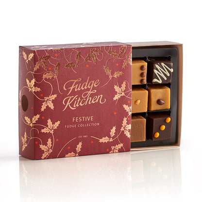 Fudge Kitchen festive fudge collection box with fudges in a decorative box on a white background.