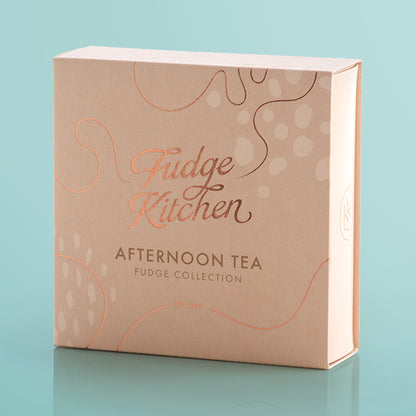 Fudge Kitchen afternoon tea packaging on a light blue background
