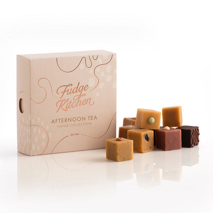 Fudge Kitchen, Afternoon Tea Fudge Selection box, angled and featured on a white background. Artisan fudge flavours displayed in a stack beside the box