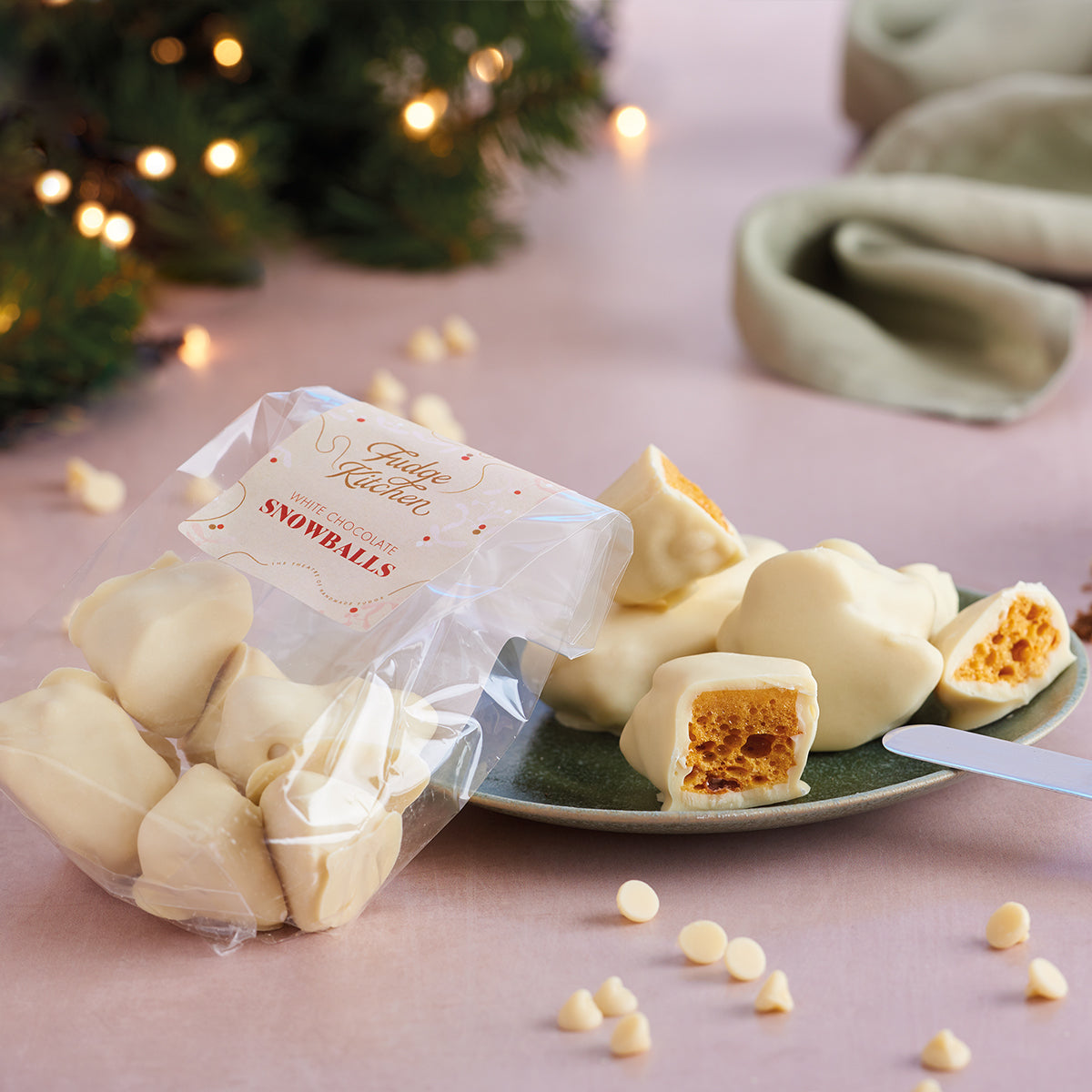 White chocolate snowballs with a visible brand label on a festive background
