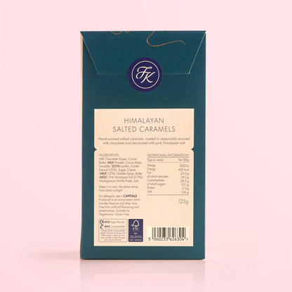 Back of Himalayan Salted Caramels packaging showing ingredient listing and allergens on a pink background