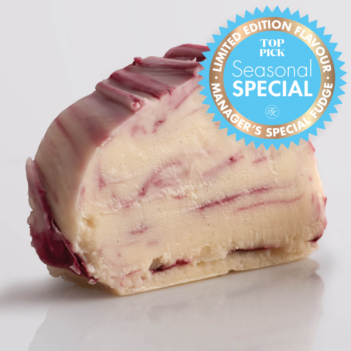 Cherry Swirl Fudge Special, a single slice of Fudge Kitchen indulgent, handmade fresh fudge flavour with a special edition emblem.