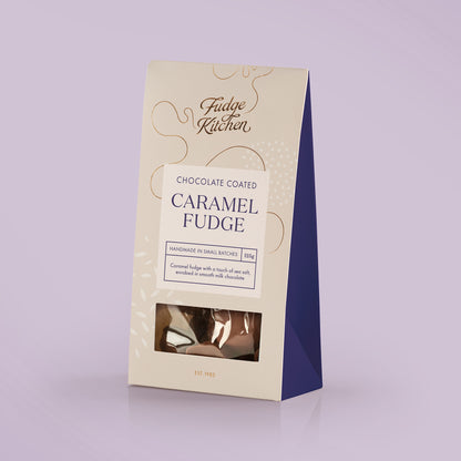 Fudge Kitchen chocolate enrobed saltedcaramel fudge packaging on a light purple background