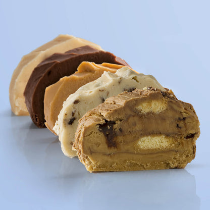Delicious slices of Father's Day fudge flavours lined up to show the difference in the flavours included in the sleection, displayed on a blue background.