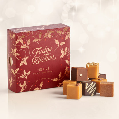 Fudge Kitchen festive fudge collection with a red box on a white background with gourmet fudges