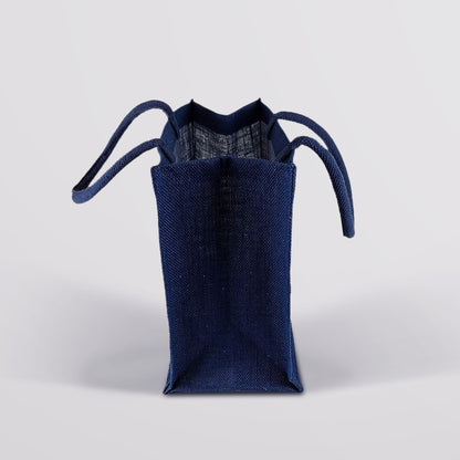 Side view of the Fudge Kitchen Hessian Bag, showing its width, depth, and spacious interior. Made from natural hessian, perfect for carrying treats or gifts.