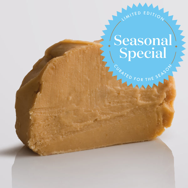 Christmas Gingerbread Fudge, a Fudge Kitchen indulgent, handmade fresh fudge flavour displayed on a grey background with a 