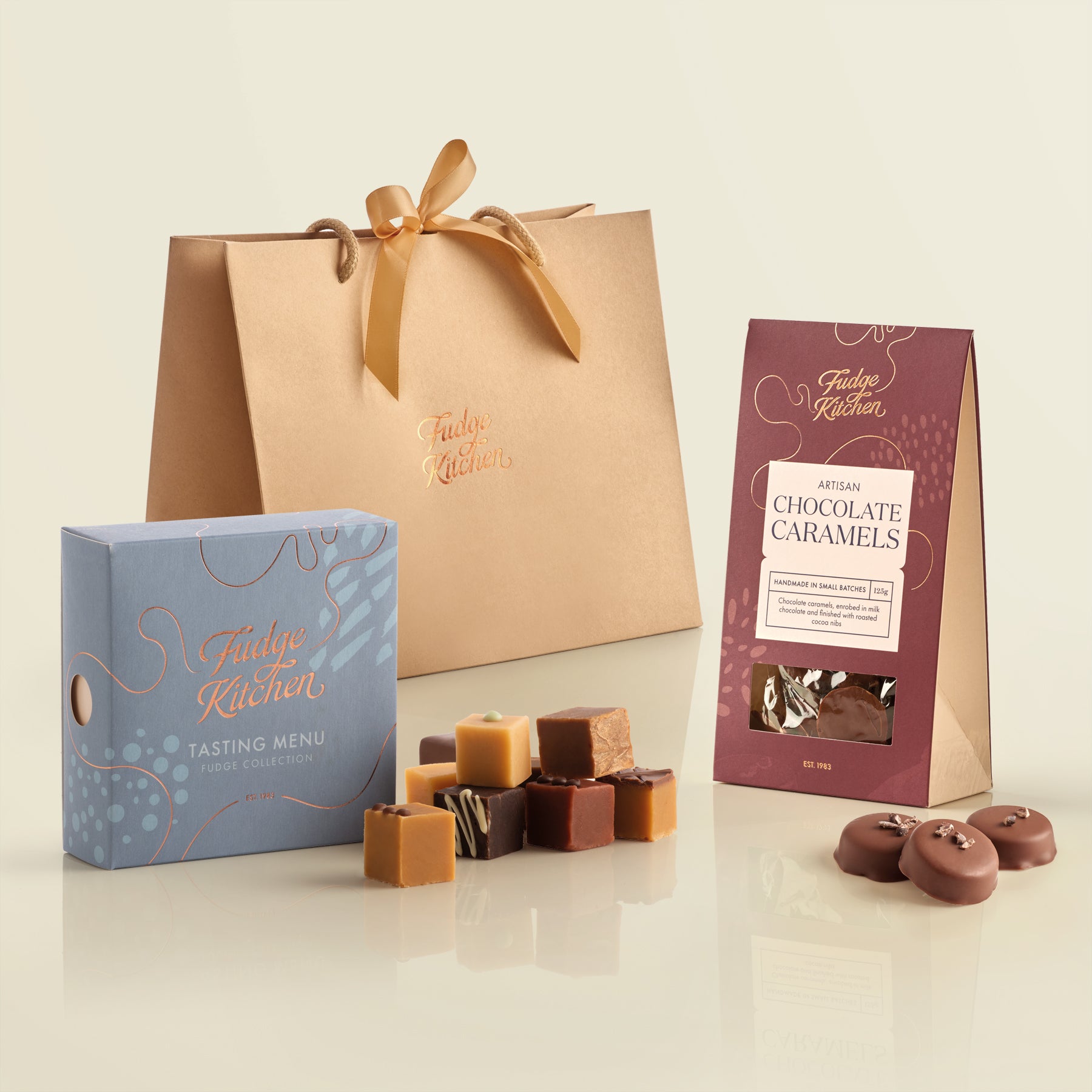 Fudge Kitchen chocolate caramels with packaging on a light background