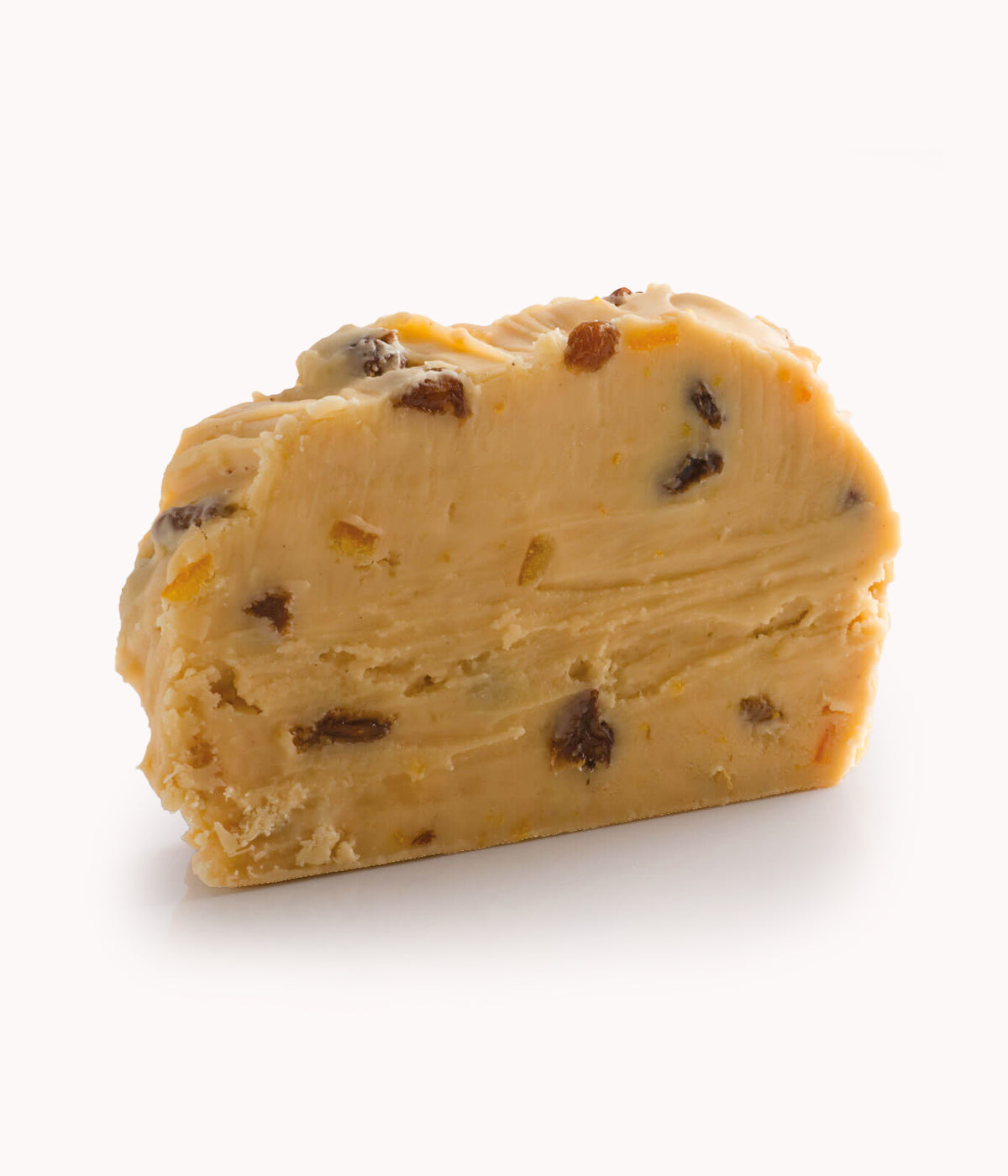 Single slice of artisan fudge. A Hot Cross Bun flavour fudge showing raisins and fruit throughout, displayed on a white background.
