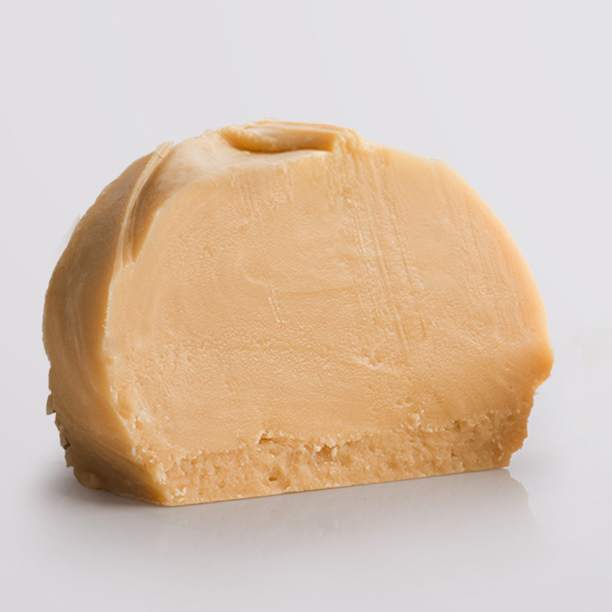Irish Cream Fudge single slice, a Fudge Kitchen indulgent, handmade fresh fudge flavour displayed on a grey background.