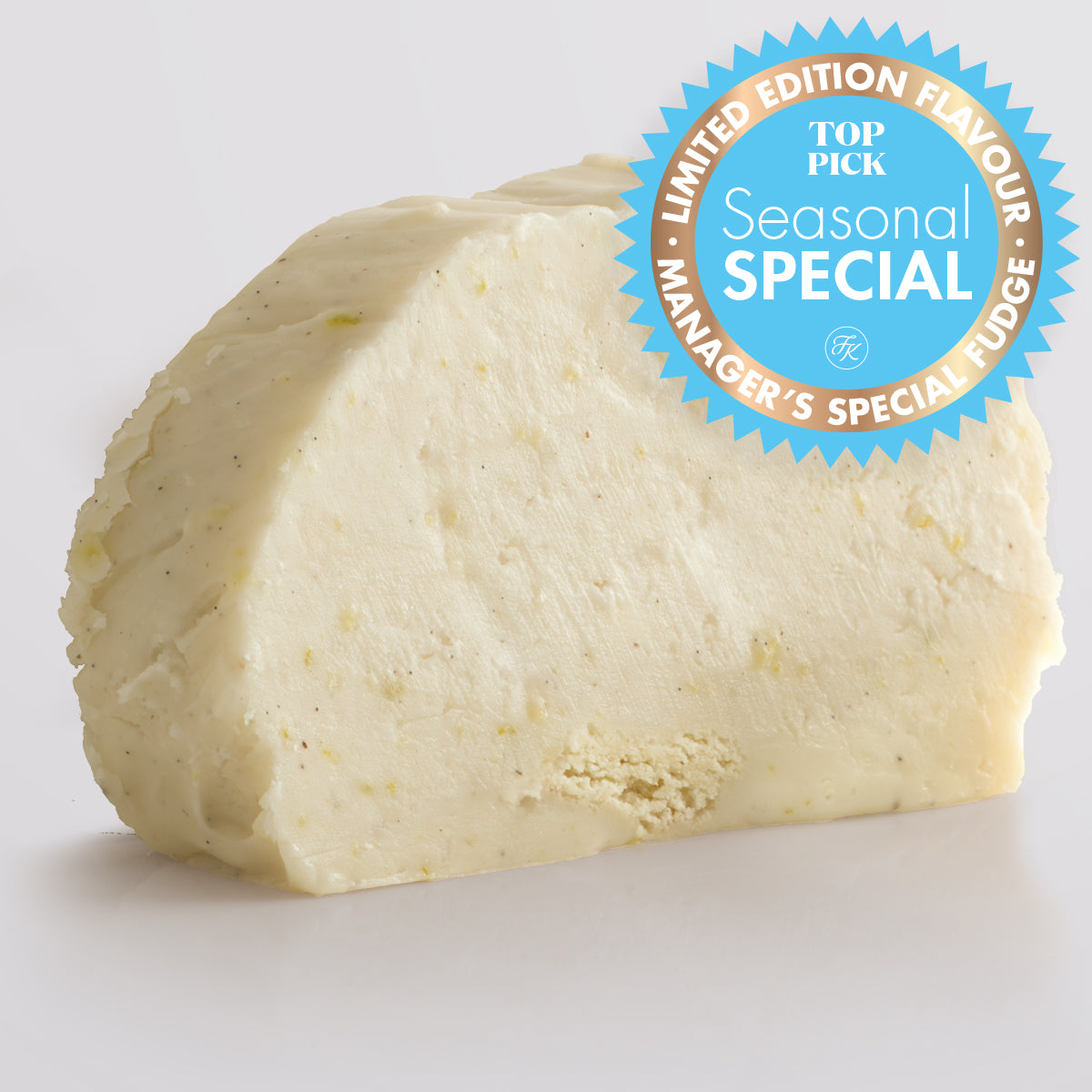 Single slice of handmade Key Lime Pie Fudge with zesty lime, cream cheese and shortbread, shown on a white background with a "seasonal special" badge.