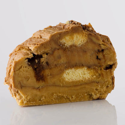 A Millionaire Shortbread Fudge, a Fudge Kitchen indulgent, handmade fresh fudge flavour. Gluten free fudge on a white background.