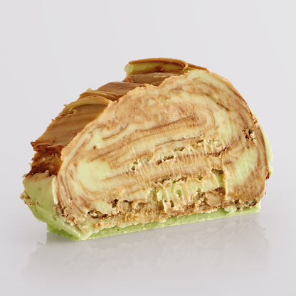 Mint Chocolate Swirl Fudge single slice, a Fudge Kitchen indulgent, handmade fudge flavour displayed on a light grey background.