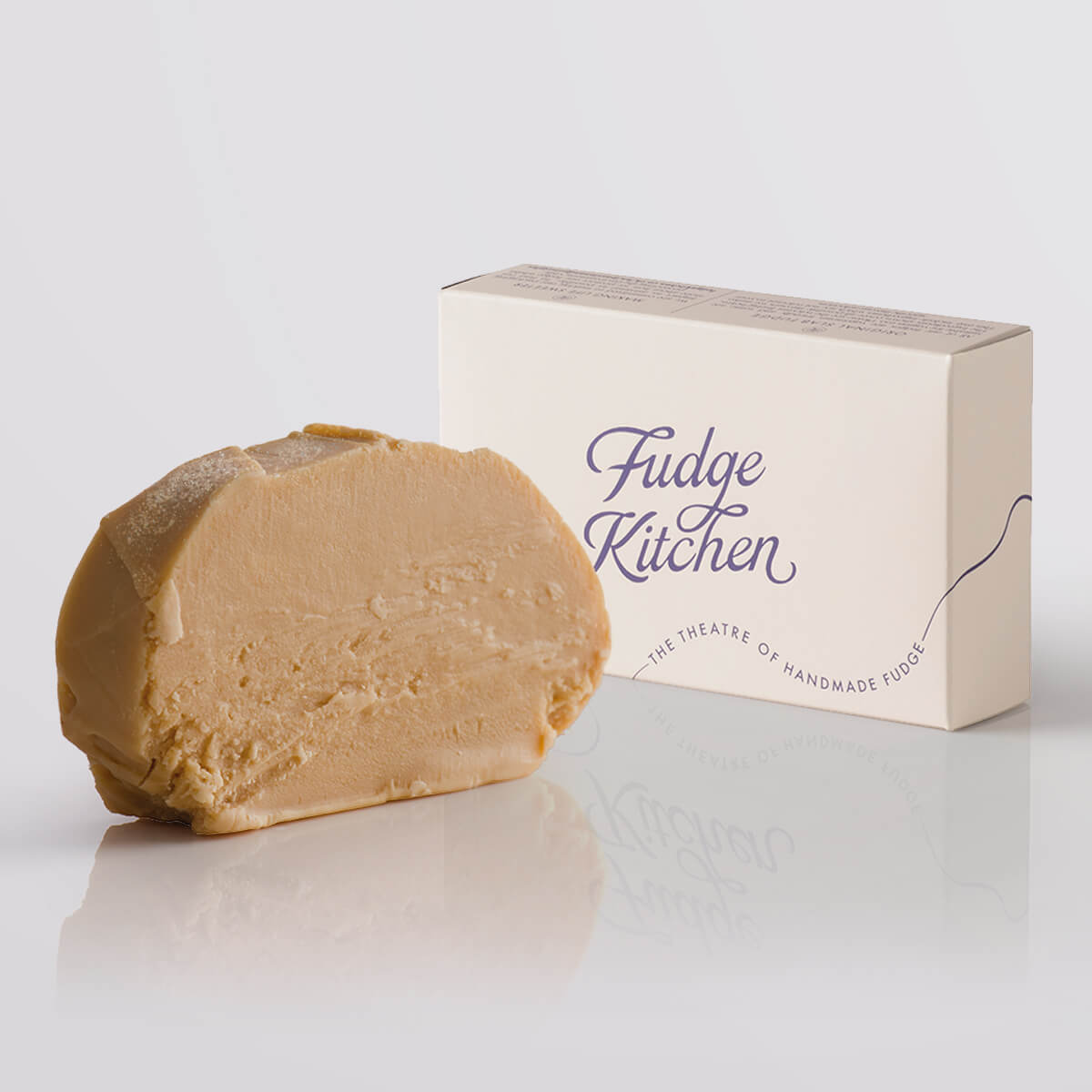 Apple Crumble Fudge single slice, a Fudge Kitchen indulgent, handmade fudge flavour displayed with an elegant gift box.
