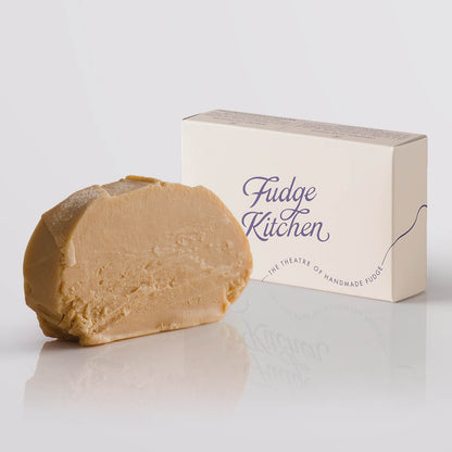 Apple Crumble Fudge single slice, a Fudge Kitchen indulgent, handmade fudge flavour displayed with an elegant gift box.