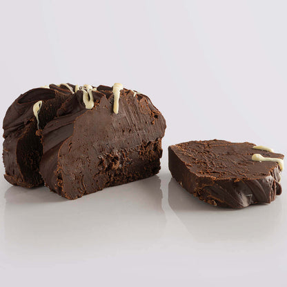 Black Forest Gateau Fudge, a Fudge Kitchen indulgent, handmade fresh fudge flavour displayed as three slices on a grey background.