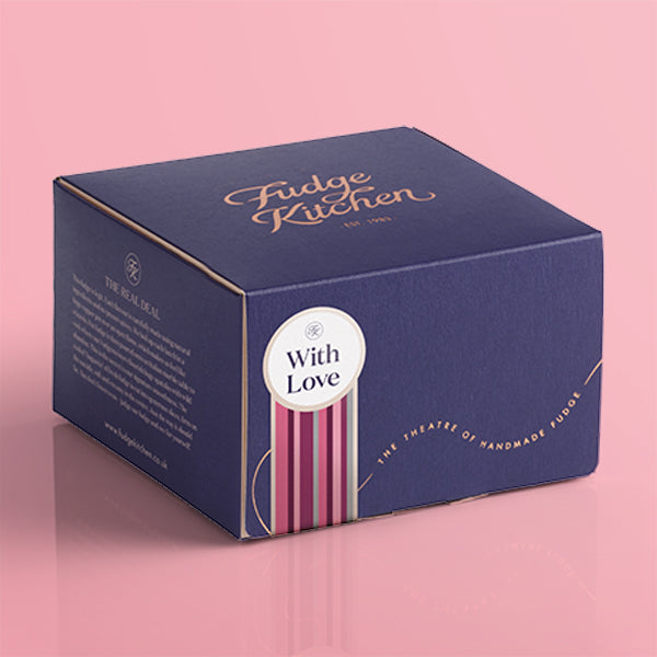 Fudge Kitchen luxury gift box on a pink background with a 
