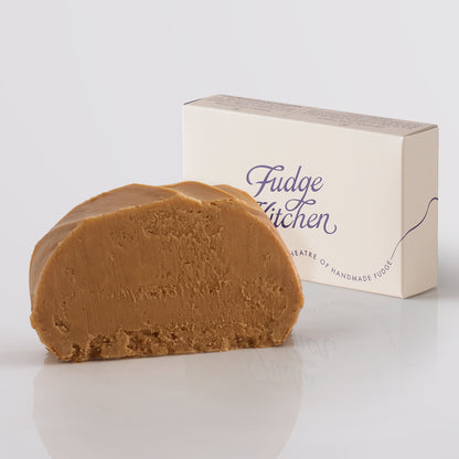 Butterscotch Fudge single slice, a Fudge Kitchen indulgent, handmade Fudge flavour displayed with an elegant gift box.