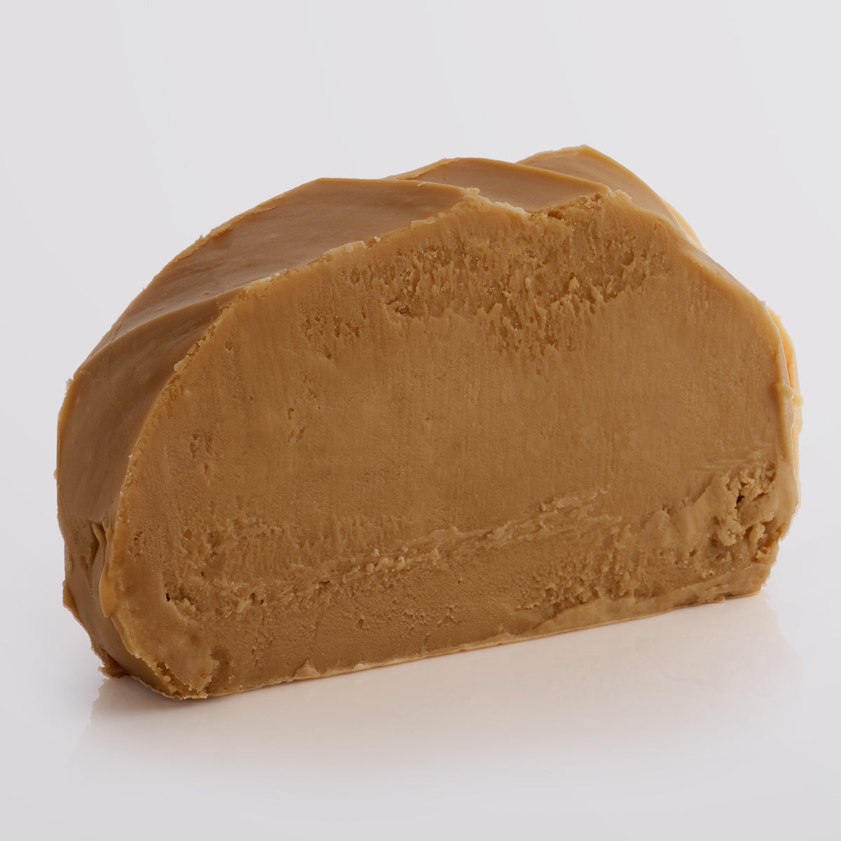Butterscotch Fudge single slice, a Fudge Kitchen indulgent, handmade Fudge flavour displayed on a light grey background.