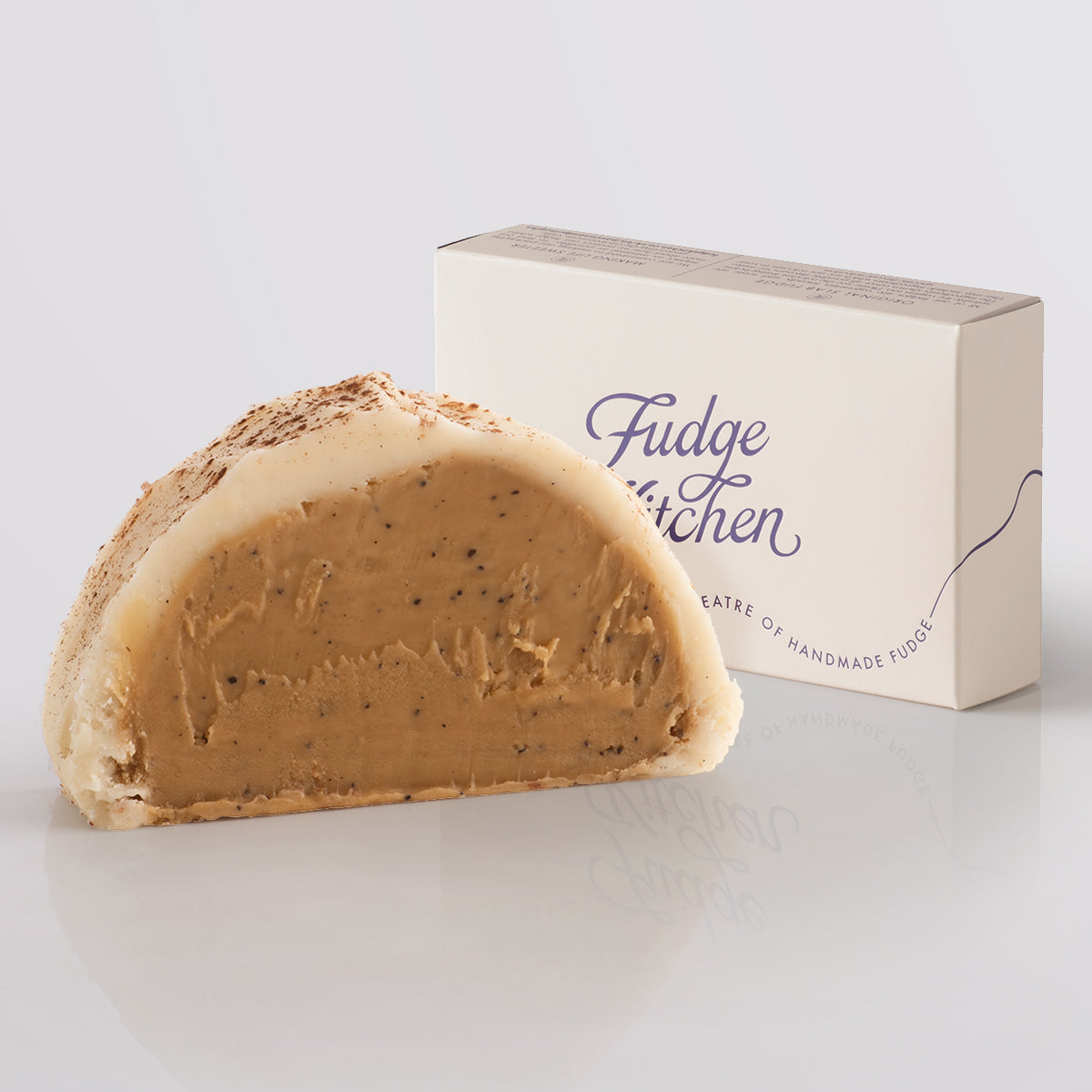 Cappuccino Fudge single slice, a Fudge Kitchen indulgent, handmade fudge flavour displayed with an elegant gift box.