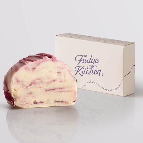 Cherry Swirl Fudge, a Fudge Kitchen indulgent, handmade fudge flavour displayed with an elegant gift box.