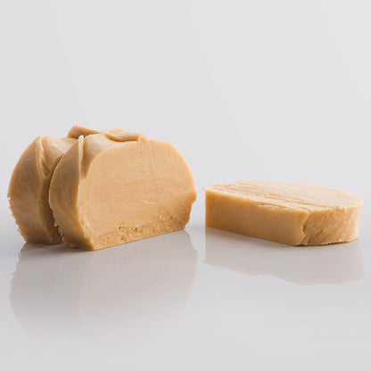 3 Slices of Irish Cream Fudge, a Fudge Kitchen indulgent, handmade fresh fudge flavour displayed on a grey background.