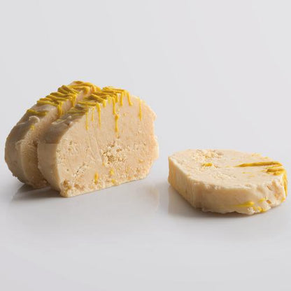 Lemon Cheesecake Fudge, a Fudge Kitchen indulgent, handmade fresh fudge flavour.