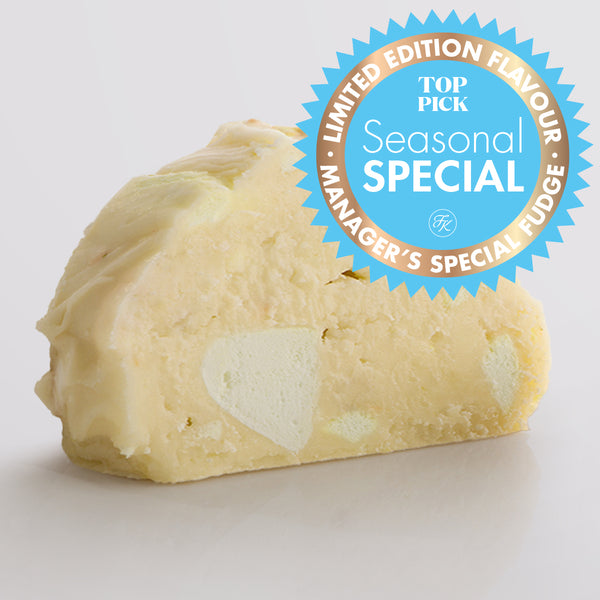 Lemon Sherbet Fudge, a Fudge Kitchen indulgent, handmade fresh fudge flavour displayed on a light, grey background and overlayed with a 