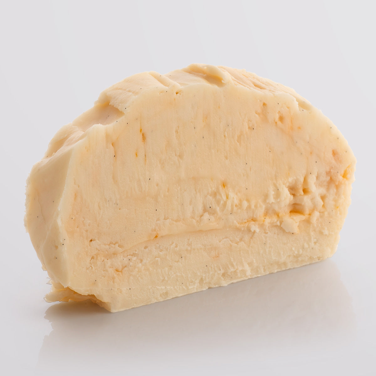 Peaches and Cream Fudge single slice, a Fudge Kitchen indulgent, handmade fudge flavour displayed on a light grey background.