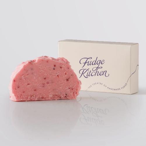 Raspberry Sorbet Fudge, a Fudge Kitchen indulgent, handmade fudge flavour displayed with an elegant gift box.