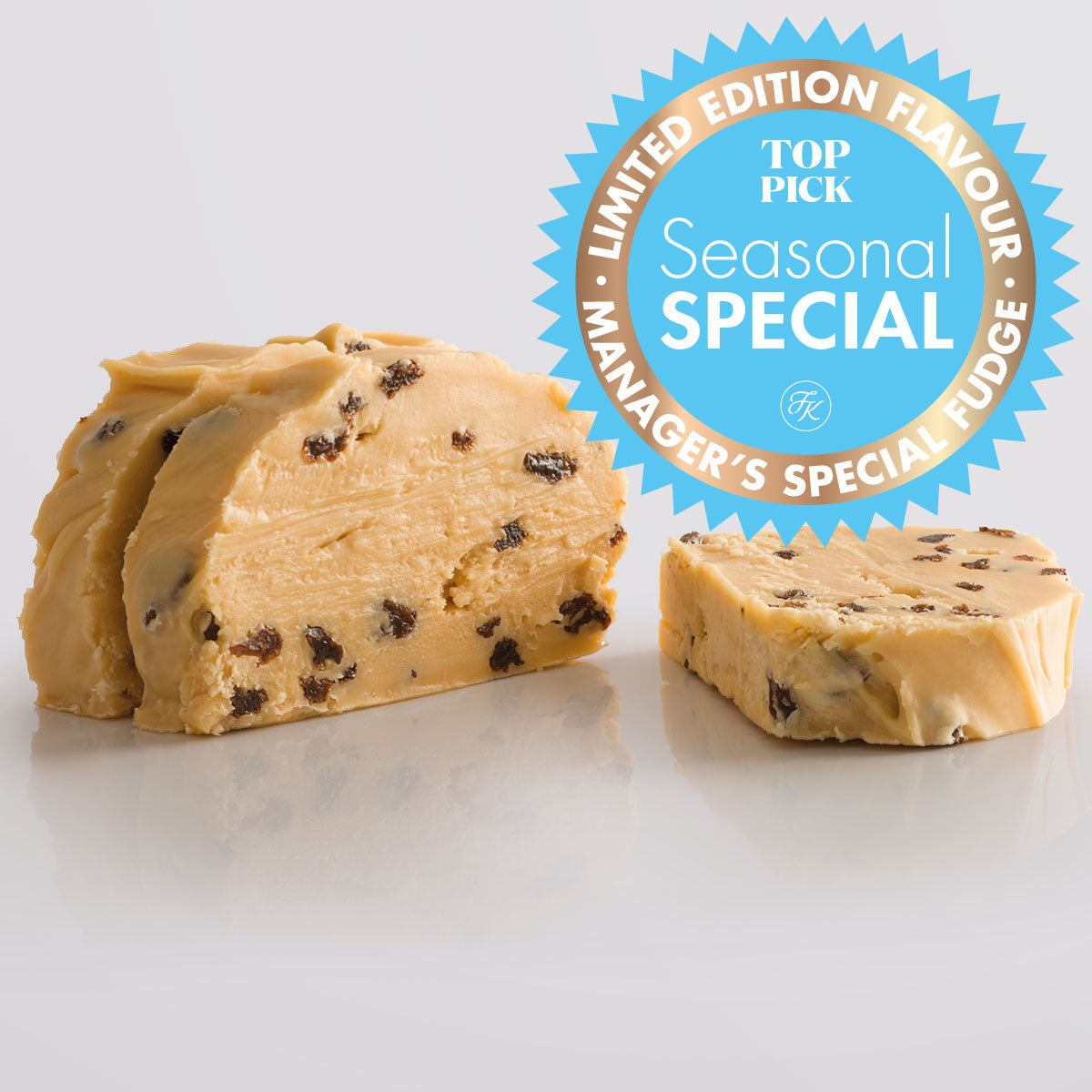 Rum & Raisin Special, a Fudge Kitchen indulgent, handmade Fudge flavour, ideal for gifting or enjoying as a treat displayed in 3 slices with a "limited edition" emblem.
