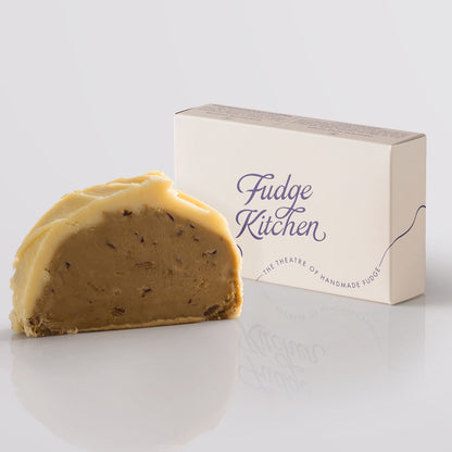 Sticky Toffee Pudding Fudge single slice, a Fudge Kitchen indulgent, handmade fudge flavour displayed with an elegant gift box.