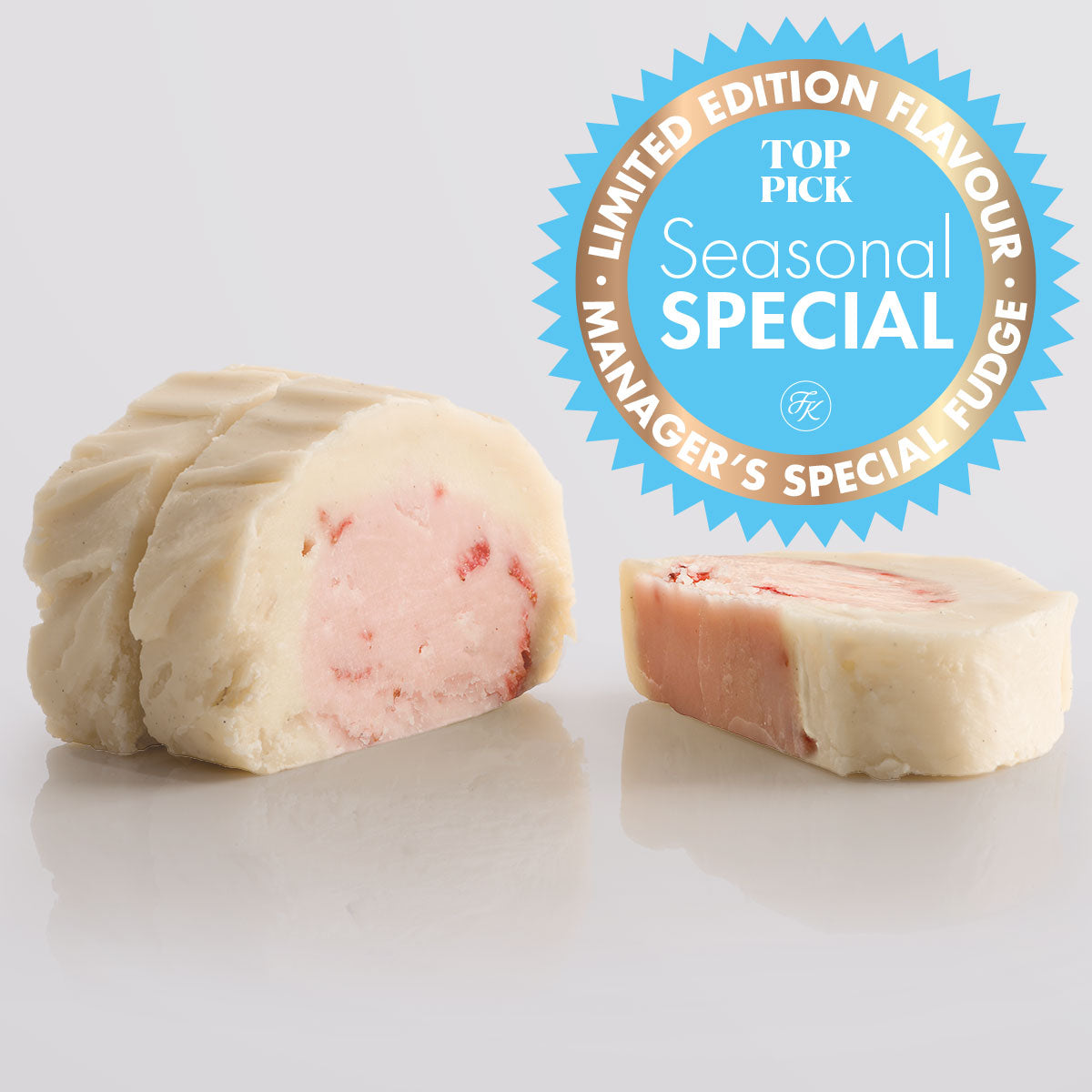 3 slices of classic Strawberries & Cream Fudge showing the two layered fudge pairing a base of ripe strawberry fudge with a silky top tier of Madagascan vanilla fudge.