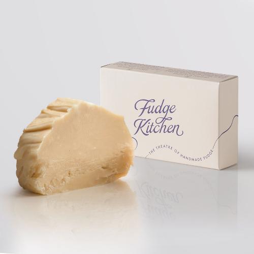 Vanilla Fudge, a Fudge Kitchen indulgent, handmade fudge flavour displayed with an elegant gift box.