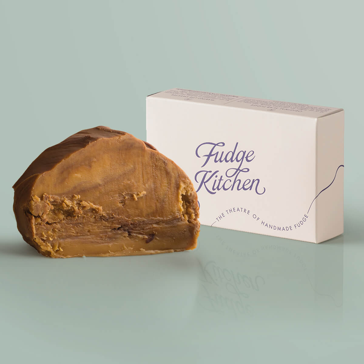 Mocha Fudge single slice, a Fudge Kitchen indulgent, handmade fudge flavour displayed with an elegant gift box.