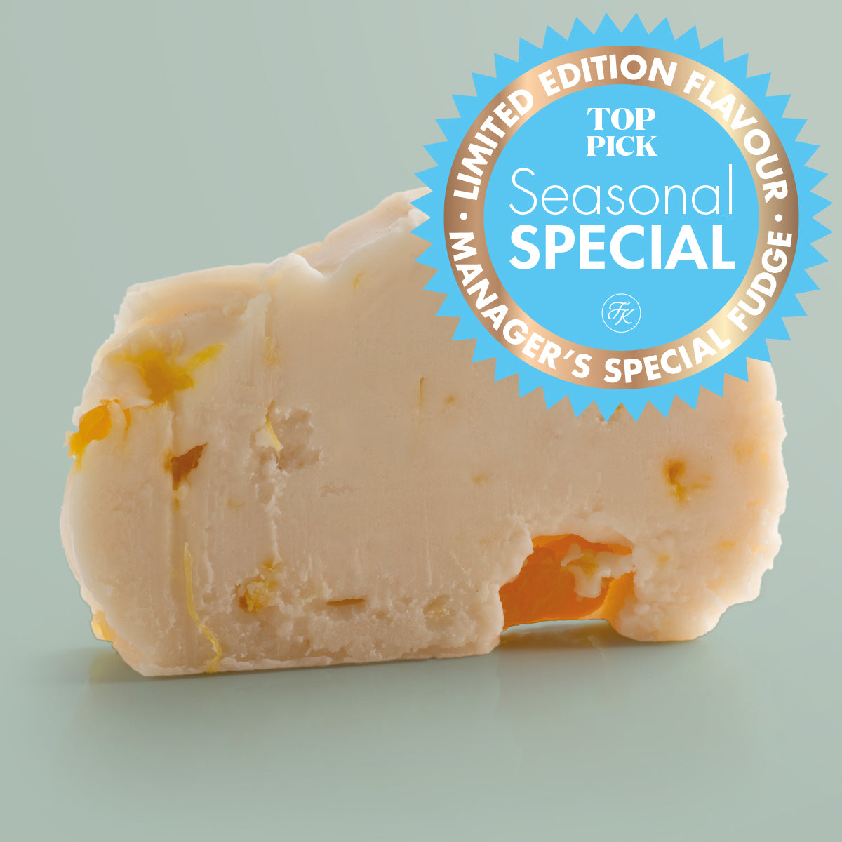 Pina Colada Vegan Fudge single slice, a Fudge Kitchen indulgent, handmade vegan Fudge flavour, ideal for gifting or enjoying as a plant-based treat displayed on a light green background and "Seasonal Special" badge.