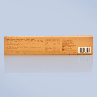 Box of handmade clotted cream fudge with nutritional information on a light blue background