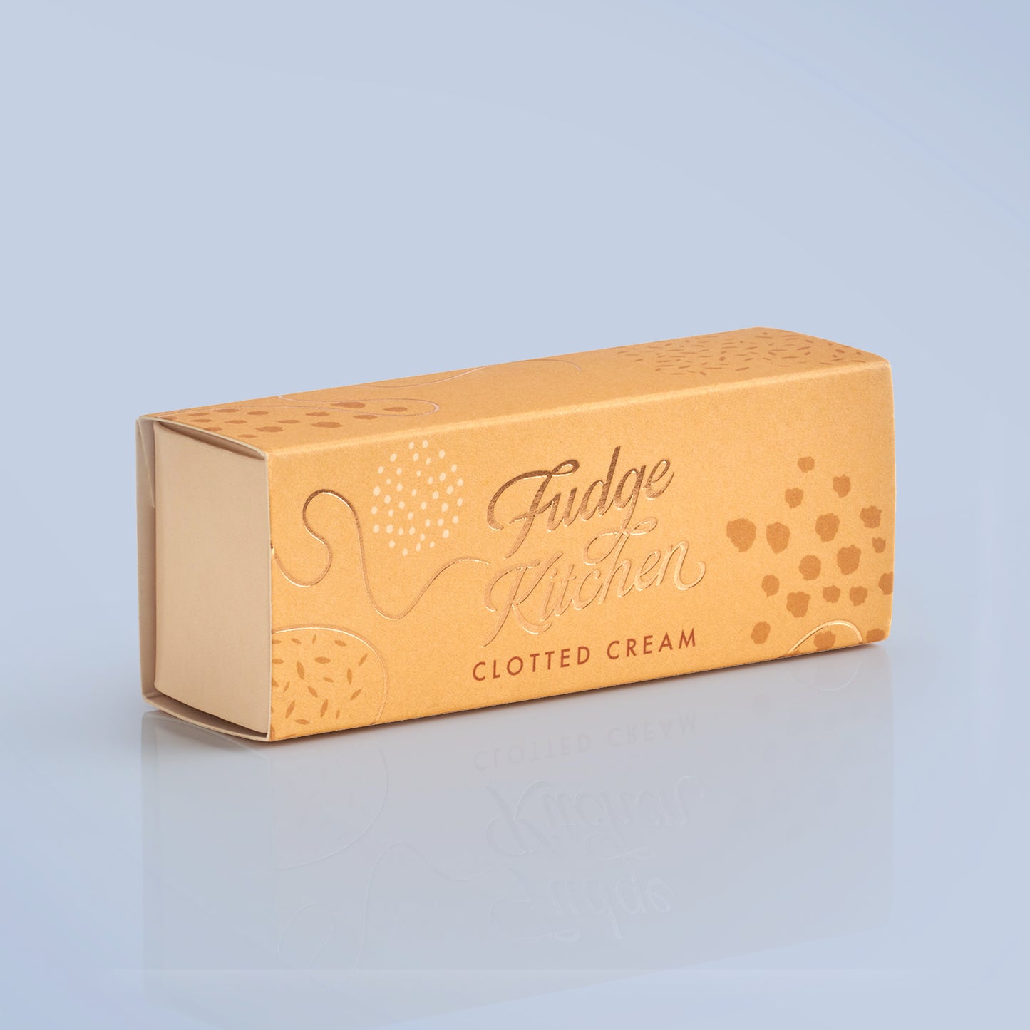 Fudge Kitchen clotted cream packaging on a light gray background