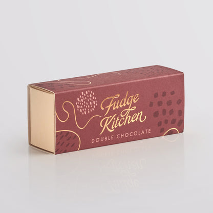 Fudge Kitchen double chocolate packaging on a light gray background