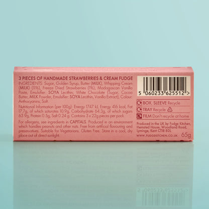 Box of handmade strawberries & cream fudge with nutritional information on a light blue background