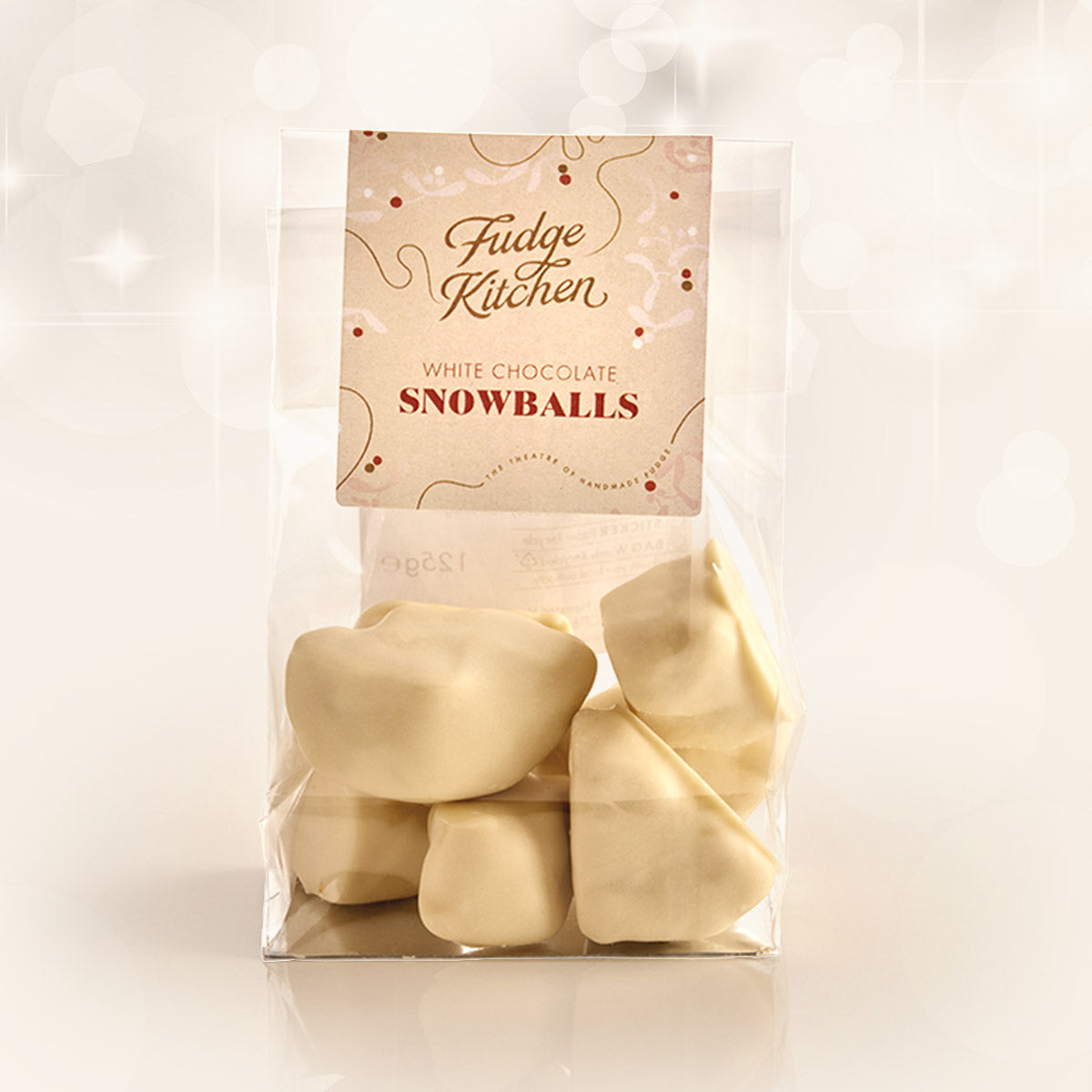 Snowball honeycomb by Fudge Kitchen, featuring crisp, golden honeycomb pieces coated in rich white chocolate. A perfect sweet treat or gift for honeycomb and chocolate lovers in the UK.