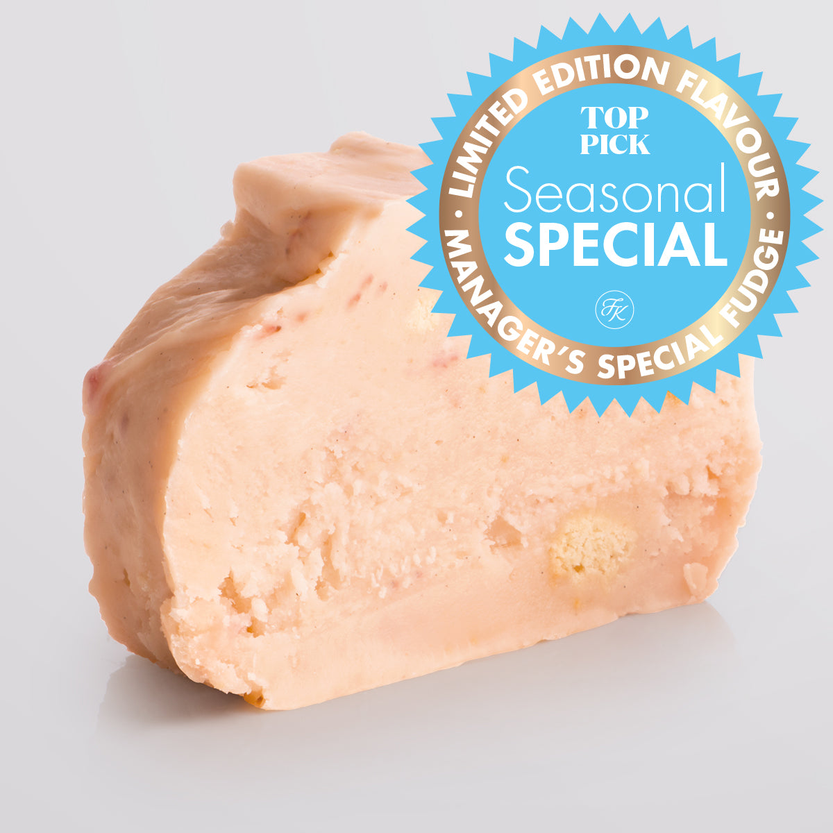Strawberry Cheesecake Fudge single slice, a Fudge Kitchen indulgent, handmade fresh fudge flavour with a Seasonal Special badge.