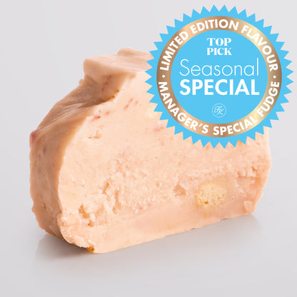 Strawberry Cheesecake Fudge single slice, a Fudge Kitchen indulgent, handmade fresh fudge flavour with a Seasonal Special badge.