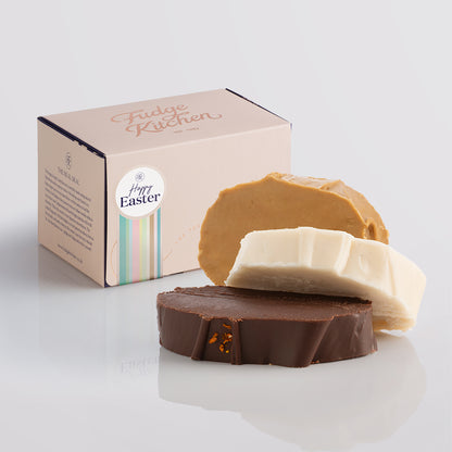 Vegan fudge trio elegantly displayed in a buff-coloured gift box with gilded accents with a 'Happy Easter' box seal.