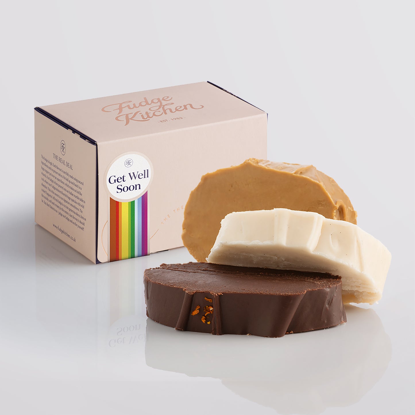 Vegan fudge trio elegantly displayed in a buff-coloured gift box with gilded accents with a 'Get Well Soon' box seal.