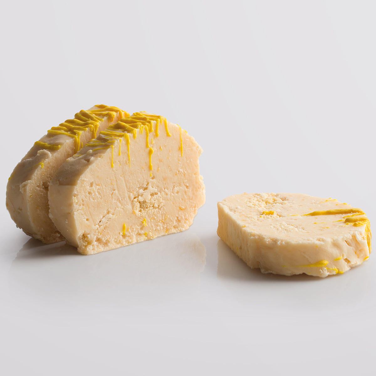 Lemon Cheesecake Fudge single slice, a Fudge Kitchen indulgent, handmade fresh fudge flavour.