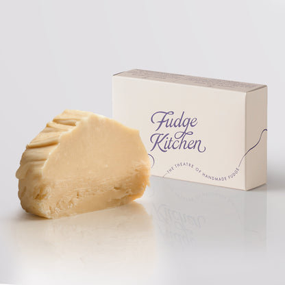 Vanilla Fudge single slice, a Fudge Kitchen indulgent, handmade fudge flavour displayed with an elegant gift box.